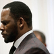 R. Kelly appears at a court hearing in Chicago June 26, 2019, on state charges he faces involving allegations of multiple sex crimes. Now, Kelly faces additional federal charges.